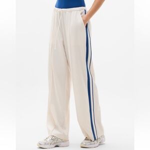 Athleta Cream Track Pants with Blue Stripe